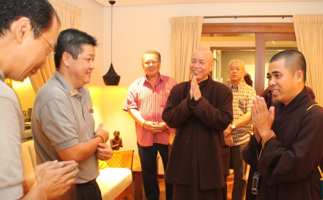 Bro. Vincent Lee (2nd left) and  Bro. Pee (left) welcoming the venerables and other guests.