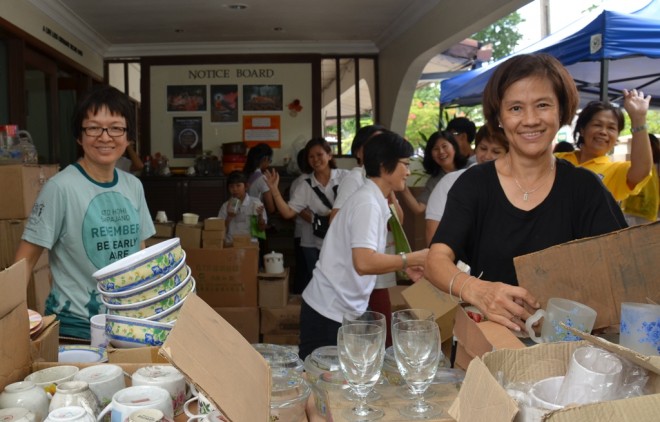 Over at Nalanda House today (Sunday, 24 July), volunteers help to sort out items to be sold during "Family Fun Fair". 