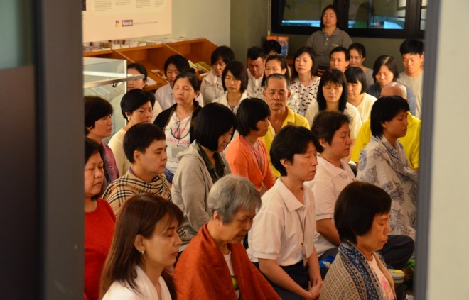 Participants sitting quietly and establishing their mindful attention on breathing.