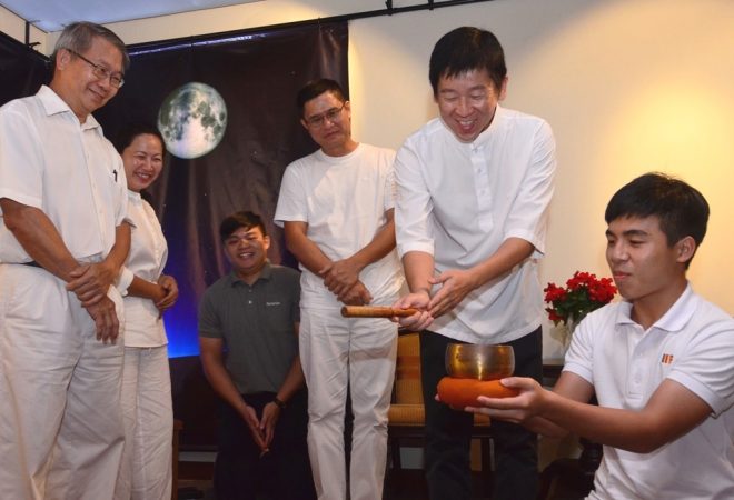 Bro. Tan striking the gong to symbolically launch the annual ‘Buddha Jayanti’ Exhibition.